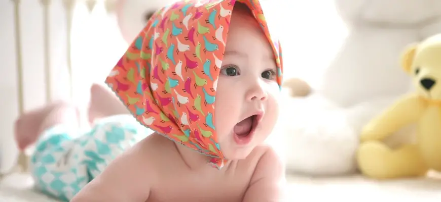 Cute baby with handkerchief headband on the head